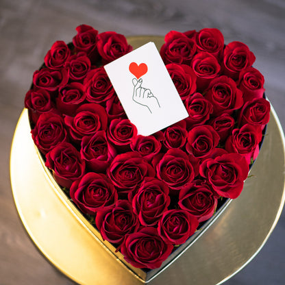 Caja de flores en forma de corazón